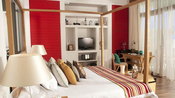 Wooden Bed And Furniture In Room At Sea Side